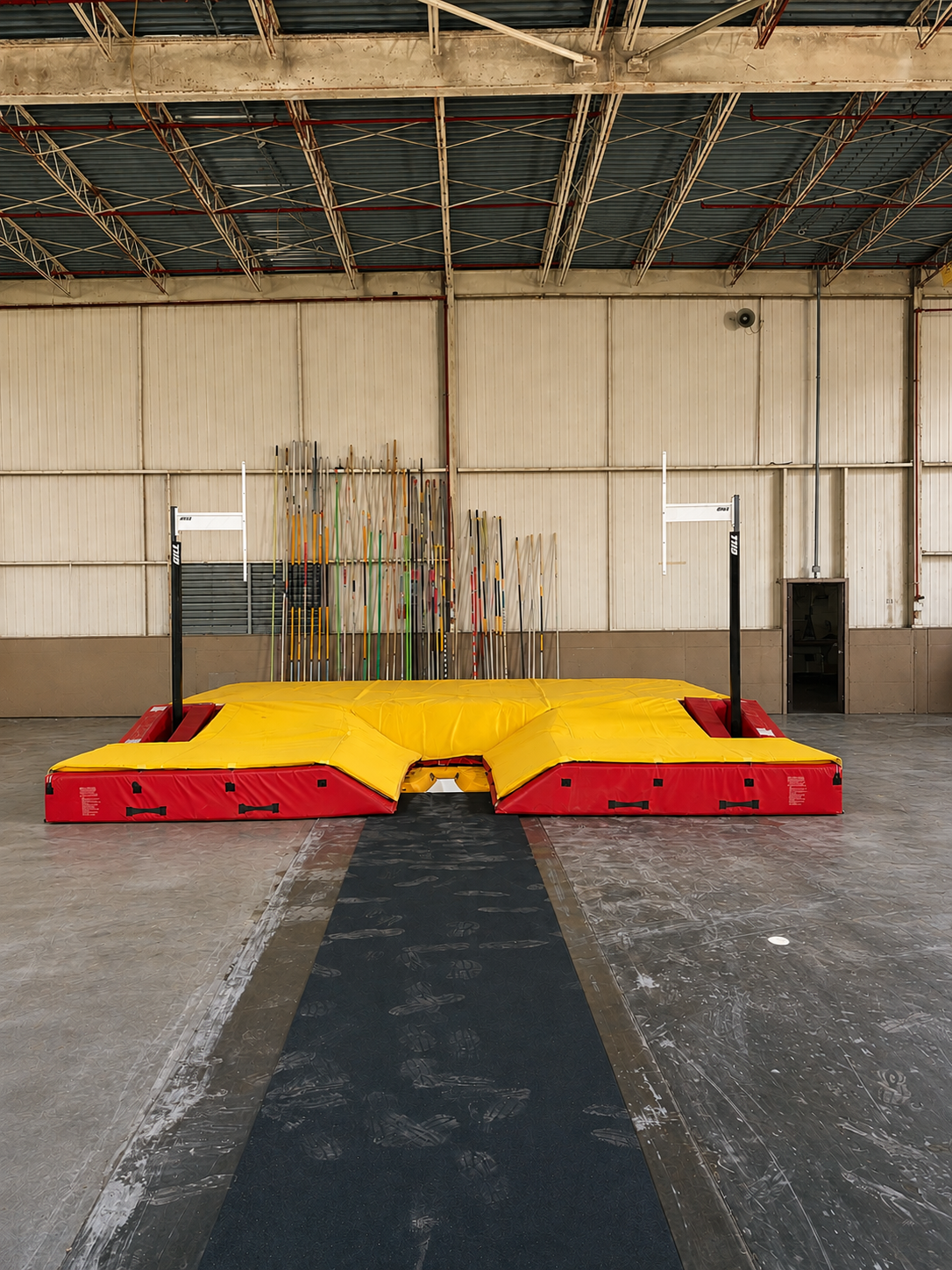 Altitude 618 pole vault pit and standards at the end of the finished runway at Aero Ranch.
